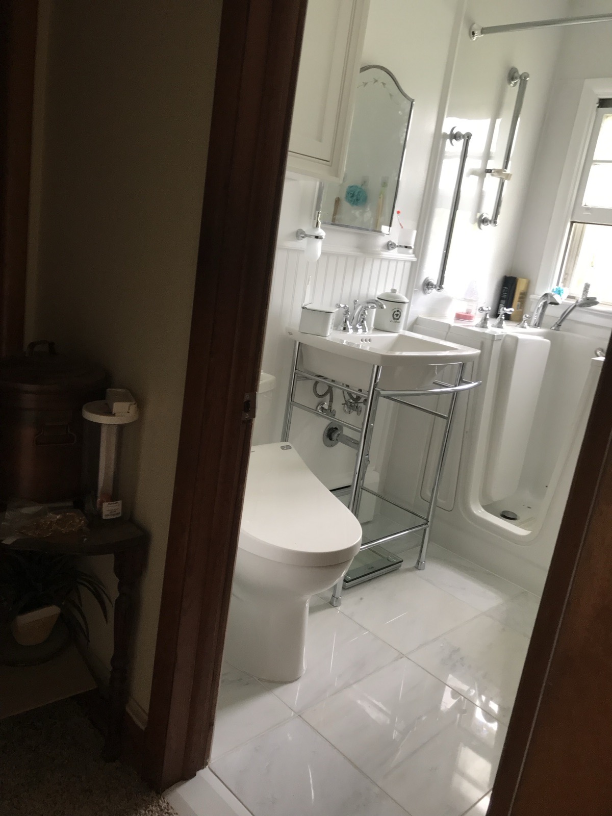 Finished accessible bathroom with walk-in tub and grab bars
